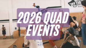 Quad skating competition at indoor skatepark.